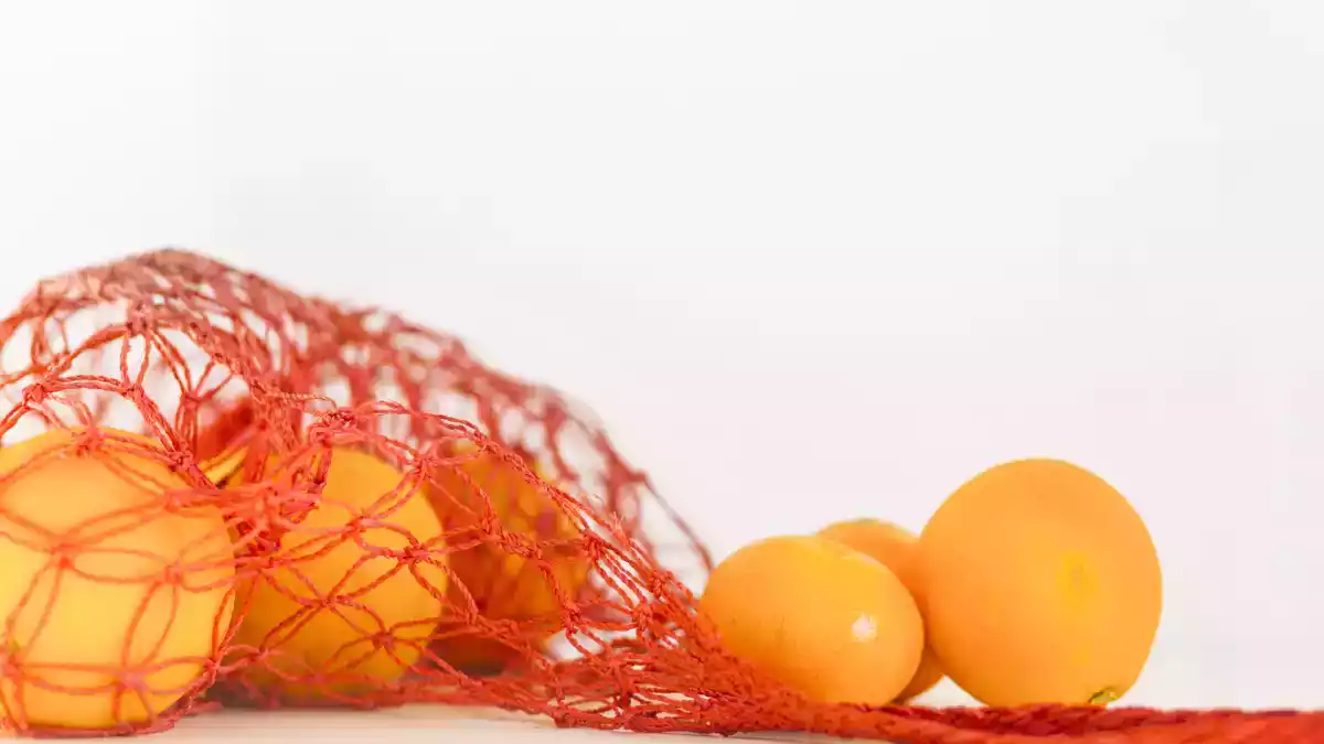 Het geheim achter gekleurde netten op supermarktfruit en -groente