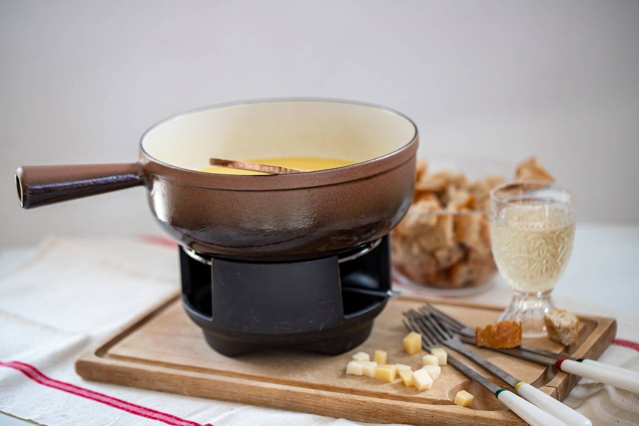 Het geheim van echte fondue: ontdek de traditionele recepten uit elke regio!