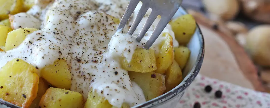 Gebakken cacio e pepe aardappelen: zo romig dat je ze nog nooit hebt geprobeerd!