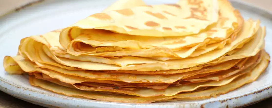 Het ingrediënt om aan het beslag toe te voegen voor lichtere (en gemakkelijker te verteren) pannenkoeken