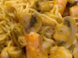 Recept Slimpasta met champignons, scampi en pompoensaus