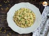 Recept Risotto met coquillettes, doperwten, courgettes, knoflook en kruidenkaas