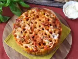 Recept Ovengebakken rigatoni-timballo met worst, bechamelsaus en mozzarella