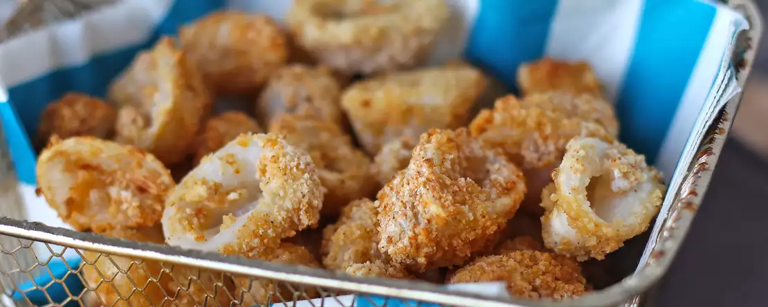 Inktvisringen in luchtfriteuse knapperig en licht