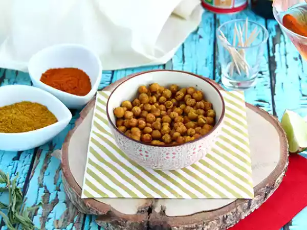 Recept Ovengeroosterde kikkererwten met kerrie
