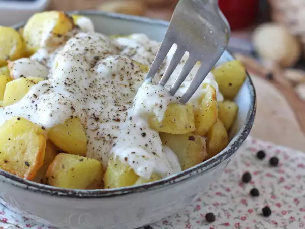 Recept Romig gebakken cacio e pepe aardappelen: het makkelijke bijgerecht waar iedereen gek van wordt!