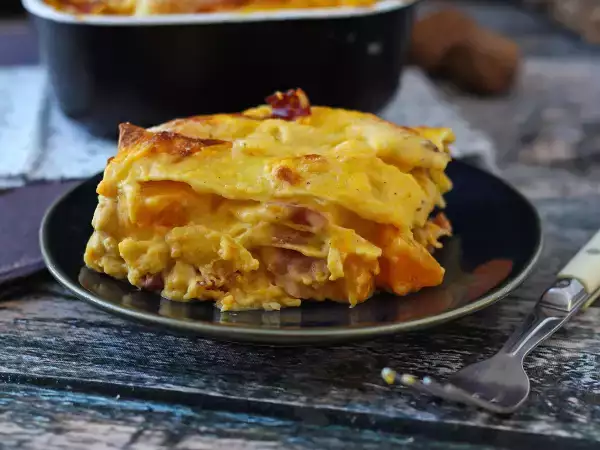 Recept Romige lasagne met pompoen, speck en knapperige walnoten