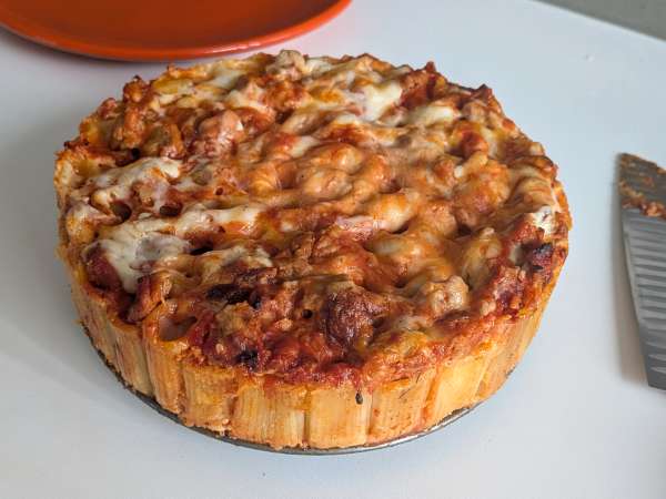Ovengebakken rigatoni-timballo met worst, bechamelsaus en mozzarella - Voorbereiding stap 14