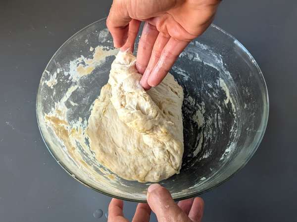 Dikke, luchtige focaccia met cherrytomaatjes, olijven en oregano - Voorbereiding stap 6