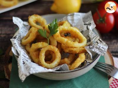 Calamares a la romana - gepaneerde inktvis in beslag