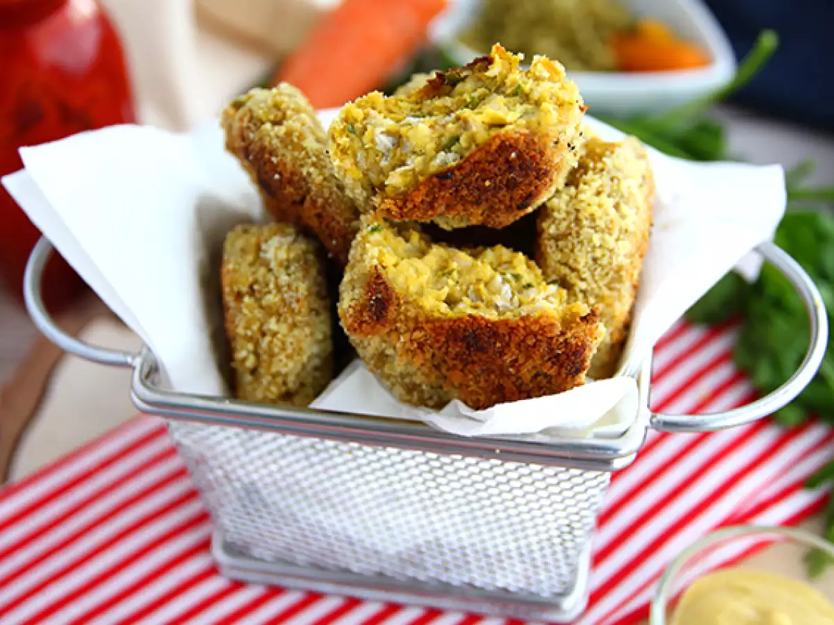 Kipnuggets met doperwten en worteltjes