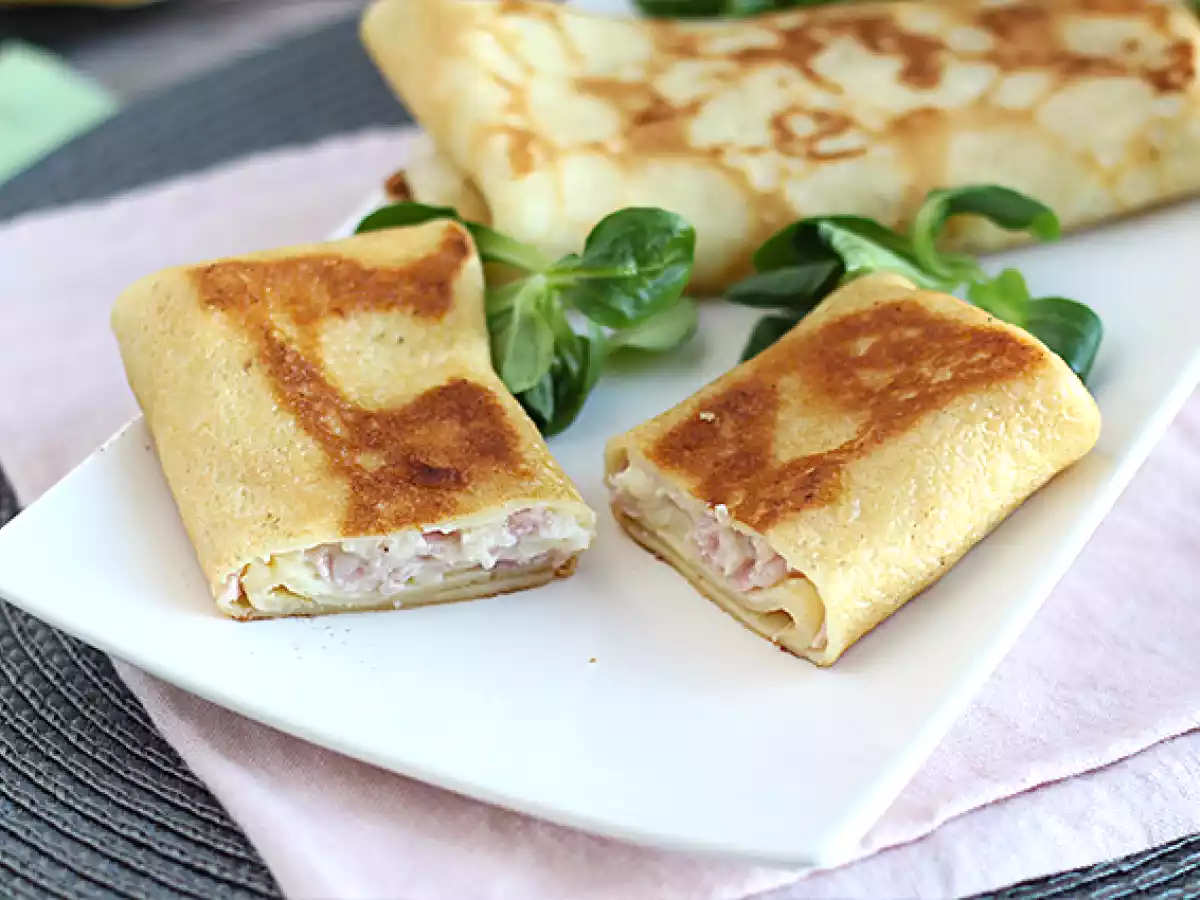 Pannenkoeken gevuld met béchamelsaus, kaas en ham