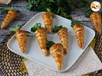 Schattige bladerdeegworteltjes voor een paasaperitief: geitenkaas en zongedroogde tomaatjes